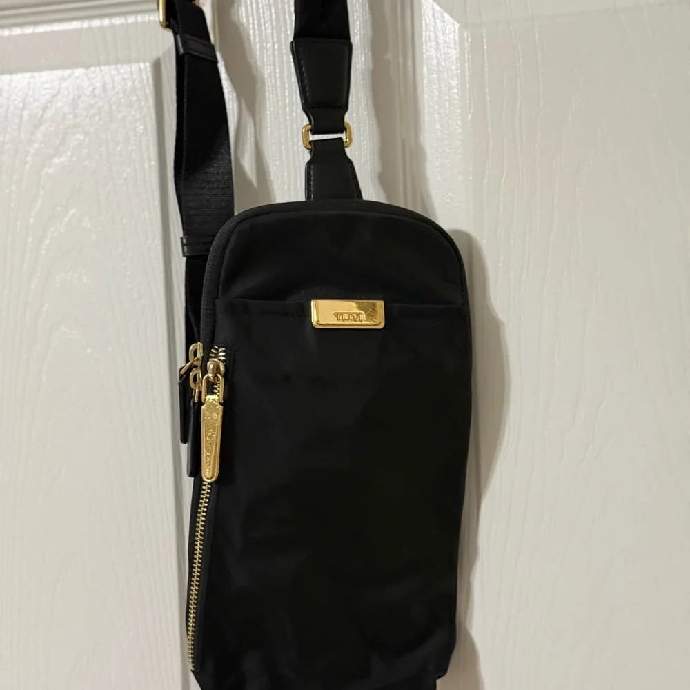 Tumi Black Belt Bag with Gold Accents - Picture 1 of 3